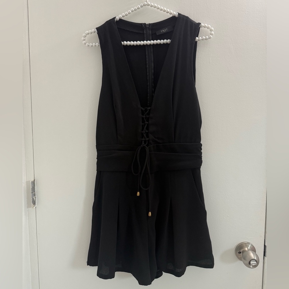 Trac Black Sleeveless Romper – Lace-Up Front Detail